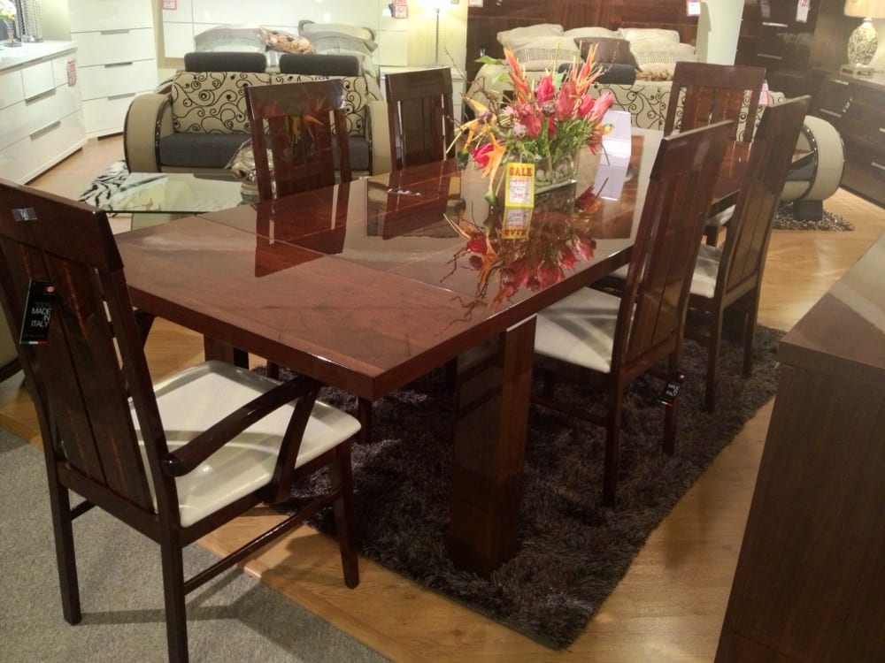 A Gorgeous Dining Table With The Shiniest Wood Surface I Ve Seen Photo Of Gallery Furniture Orlando Fl United States A Gorgeous Dining Table