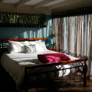 Photo of Back 2 Earth - Berry New South Wales, Australia. Accommodation. Queen sized bed, comfortable linen.