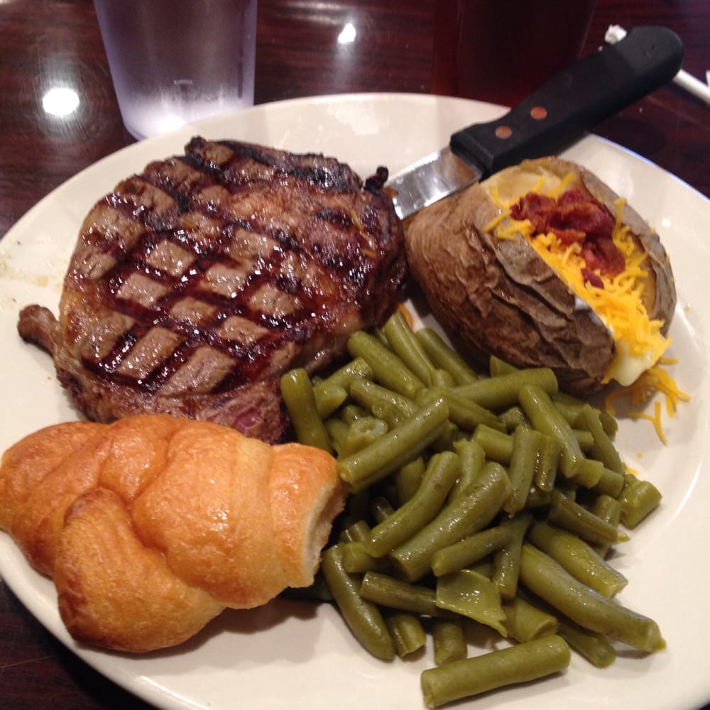 A Delicious Ribeye Steak With Tender Green Beans Loaded Baked Photo Of Pickles Restaurant Edmond Ok United States A Delicious Ribeye Steak