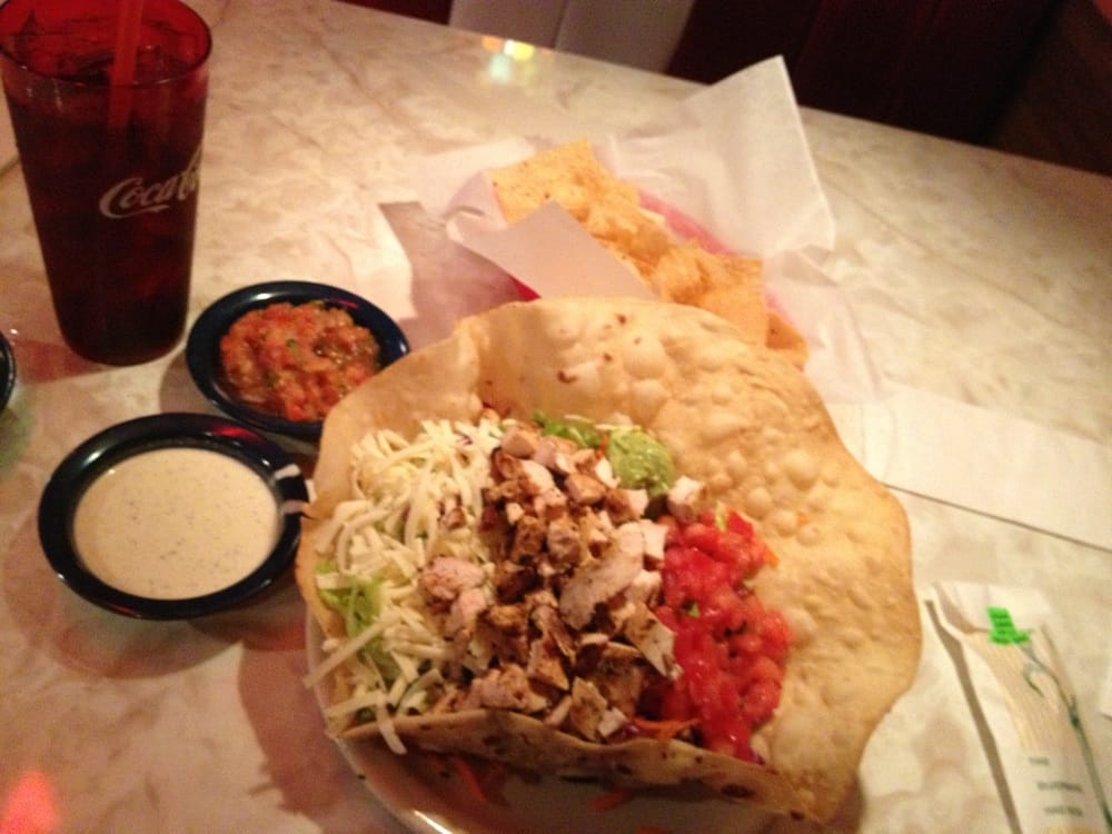 Chicken taco salad best topped with creamy jalapeño sauce. Yelp