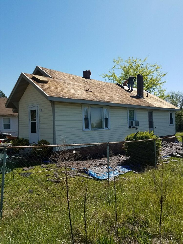 Snug Roofing Solutions